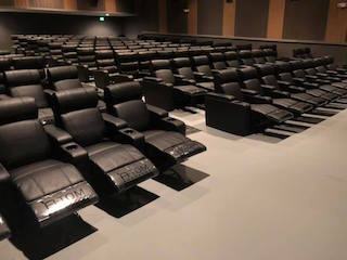 With more than 2,700 chairs ordered for four of its locations in the United States, Rochester Theater Management has begun installing Luxury Recliners, Gliders and Rockers from Spaces And Between’s Atom Seating division.