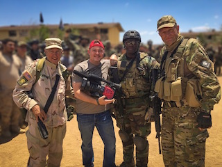 Director/DP Dave Craig, center, on location for the Operation Lion Claws Military Simulation Series.