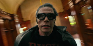 Quicksilver uses his hyper-speed ability to rescue students from an exploding mansion.