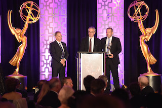 Left to right, Glenn Kennel, Harald Brendel, and Frank Zeidler accept the Engineering Emmy Award for Arri Alexa camera system. Photo by Phil Mccarten/Invision for the Television Academy/AP Images