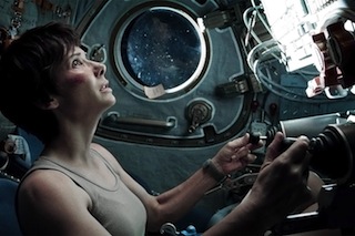Sandra Bullock begins her attempt to return to Earth.