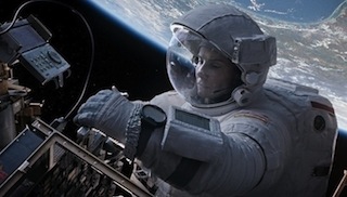 Sandra Bullock in Gravity. The movie opens with a 12-minute single take shot.