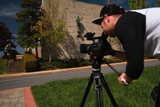 Cinematographer Nick Pisciotta shooting the USD Skate Team using a Sachtler Ace L tripod.