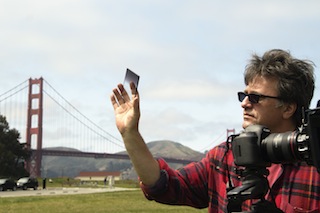 Cinematographer Alex Pitt on location near San Francisco's Golden Gate Bridge.