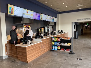 Once inside guests are greeted by a new concession stand and a self-serve drink station. 