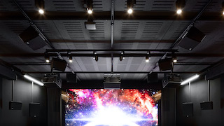 The innovative screen channels are part of a complete Dolby Atmos system that has quickly recallable snapshots for theatrical or 9.1.6 home entertainment playback modes. The balance of the system comprises a total of 37 self-powered Meyer Sound cinema loudspeakers, including HMS Series lateral and overhead surround loudspeakers bolstered by USW-210P subwoofers for surround bass management and X-400C cinema subwoofers with very low frequency control elements for bass management and LFE.