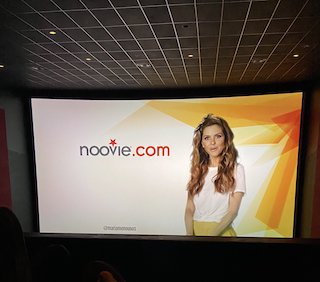 Our show has evolved over the years to include a live host (Maria Menounos) interactive engagement with our Noovie Arcade app, and other more modern elements, but fundamentally, it’s the same idea now as it was when we launched in 2002 — to create a better and more engaging pre-show to give consumers something great to watch before their movie starts.