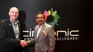 Cinionic CEO Wim Buyen, left, with PVR Cinemas CEO Gautam Dutta.