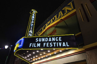 Citing concerns about the Omicron variant with its unexpectedly high transmissibility rates and the limits of health safety, travel, and other infrastructures across the country the organizers of the Sundance Film Festival have announced that the festival’s in-person Utah elements will be moving online this year.