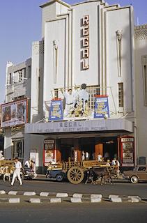 Regal Cinema, an iconic art deco building in the heart of Mumbai, was opened in 1933.